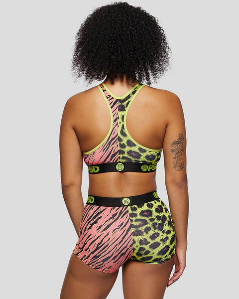 Sports bra and shorts set with neon yellow and pink zebra and leopard print patterns, black trim, and circular logo details.