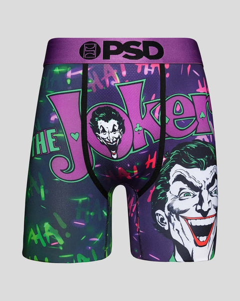 PSD boxer briefs featuring Joker character artwork in purple, green, and black with graphic text design and waistband logo.