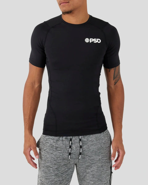 Black compression tee with short sleeves and white PSD logo on chest.