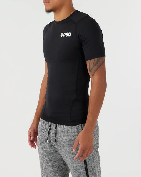 Black compression tee with @PSD logo on chest and short sleeves.