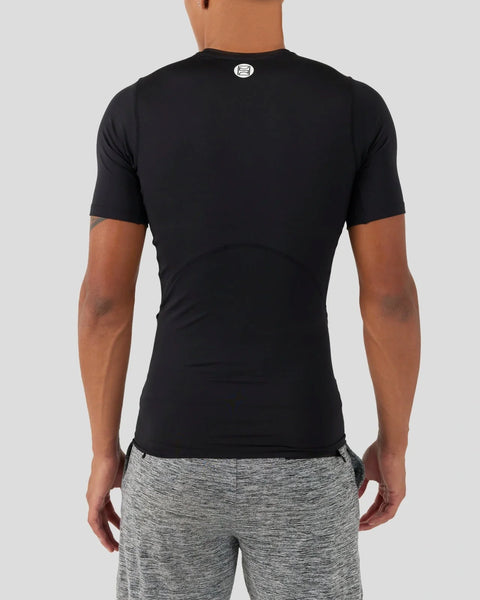 Black short-sleeve compression tee with fitted silhouette and small logo patch on back neckline.
