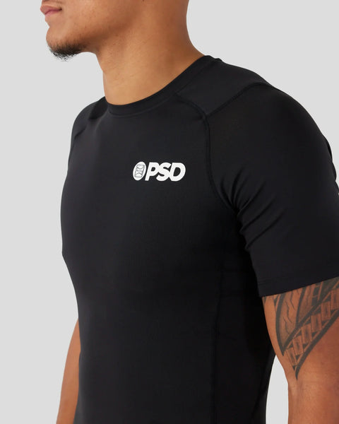 Black short-sleeve compression tee with white PSD logo on chest.