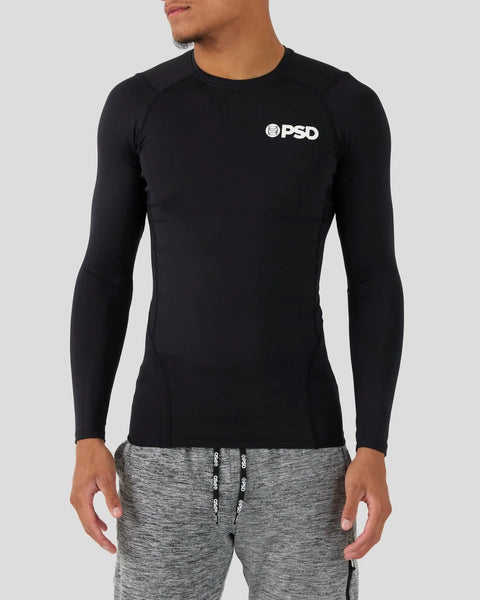 Black long-sleeve compression tee with PSD logo on chest and fitted construction.