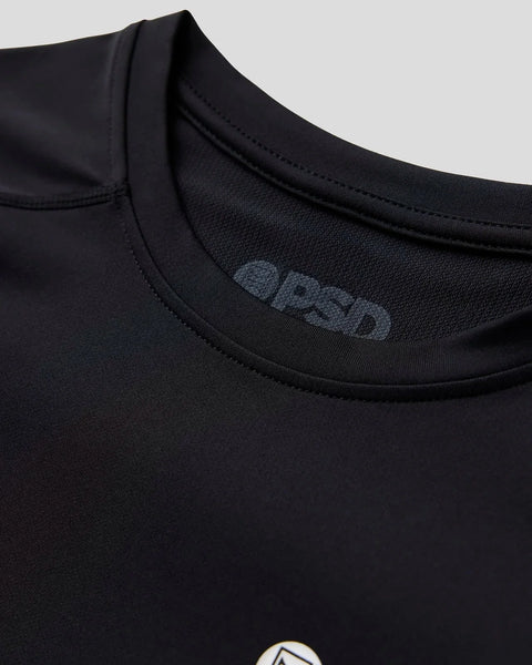 Black long sleeve compression tee with crew neckline and tonal logo at chest.