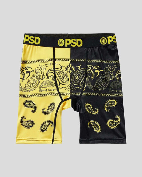 PSD boxer briefs with yellow left side and black right side, featuring paisley patterns and decorative borders.