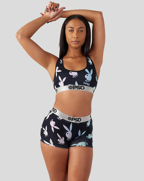 Black sports bra and shorts set with white rabbit print and gray elastic waistband featuring PSD logo.