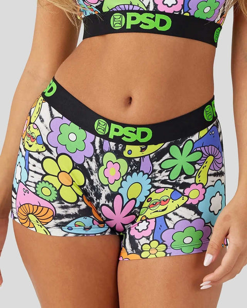 PSD underwear with colorful flower and psychedelic print, black elastic waistband with green logo.
