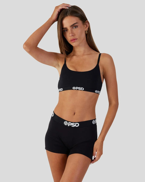 Black modal bralette and shorts set with branded waistband trim.