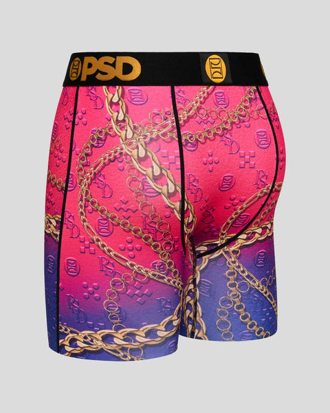 PSD boxer briefs with hot pink to blue gradient, gold chain and logo pattern, black waistband.