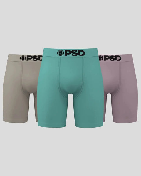Three solid-colored boxer briefs in tan, teal, and mauve with PSD waistbands.