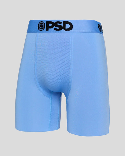 Light blue PSD brand boxer briefs with black waistband logo and textured fabric.