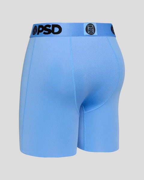 Light blue PSD boxer briefs with black waistband logo and textured side panels.