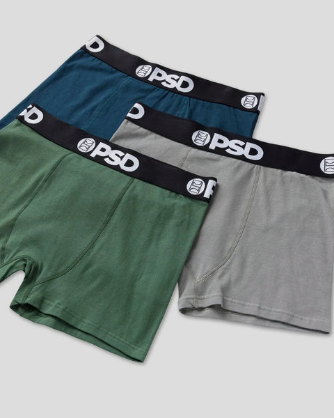Three solid-colored briefs in dark teal, green, and gray with black PSD waistbands.