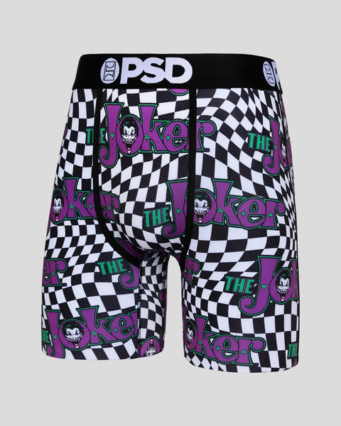 PSD brand boxer shorts with black and white checkerboard pattern and purple Joker character graphics throughout.