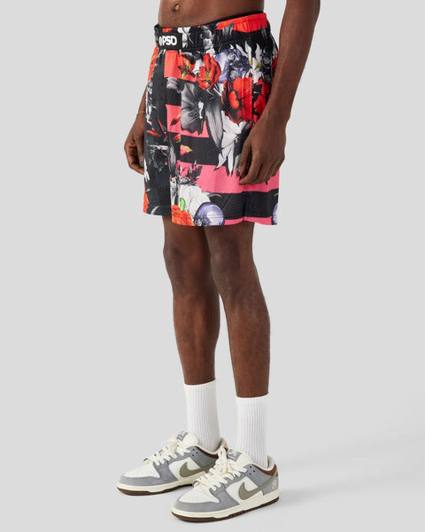 Men's athletic shorts with red, black, and white floral print pattern and mesh panels.