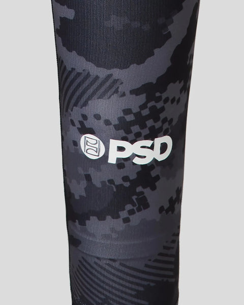 Black and gray digital camouflage tight with PSD brand logo and ribbed fabric texture.