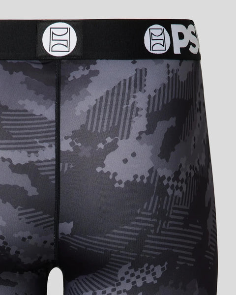 Black and gray camouflage patterned athletic tights with branded waistband and logo details.