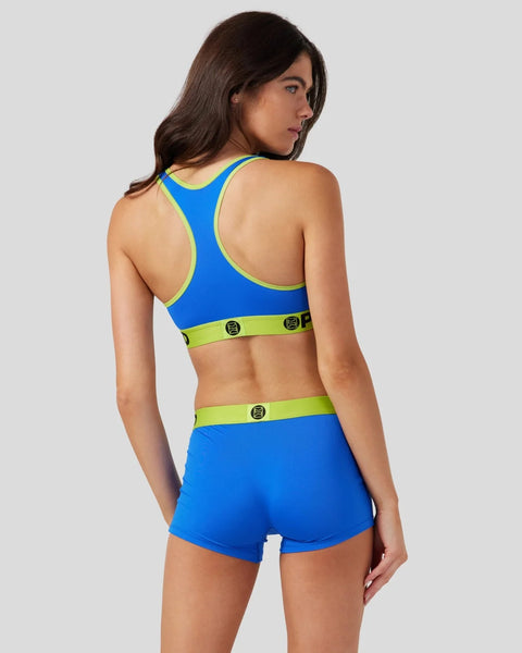 Blue and neon yellow racerback sports bra and shorts set with adjustable straps and logo details.
