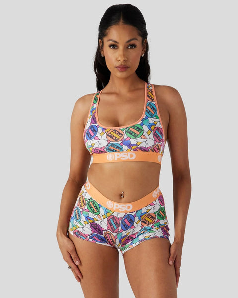 Playboy Geo two-piece set with colorful geometric pattern, racerback sports bra and matching shorts with orange waistband.