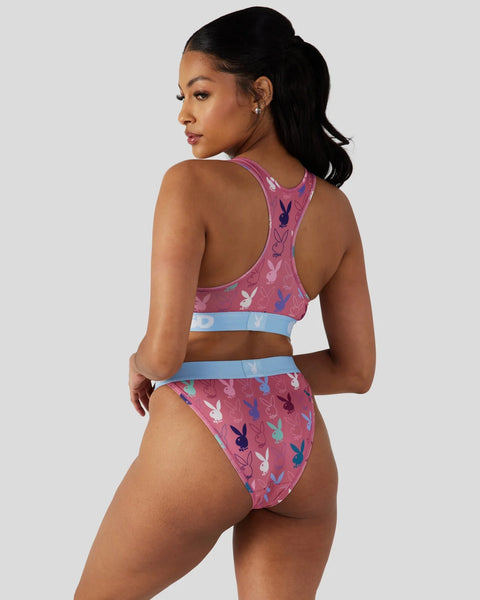 Two-piece swimsuit set with pink bunny print top and matching briefs with blue elastic bands.