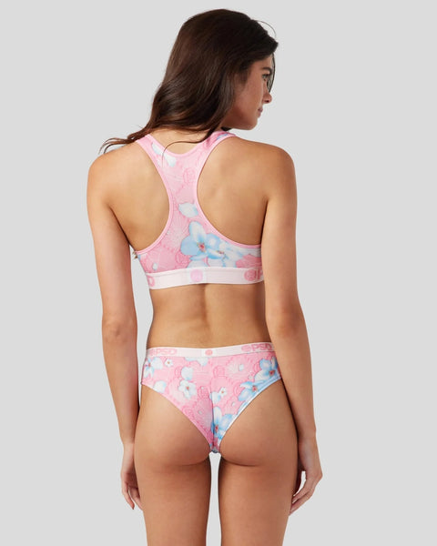 Pink sports bra and underwear set with blue butterfly and floral print, white trim, shown from back view.