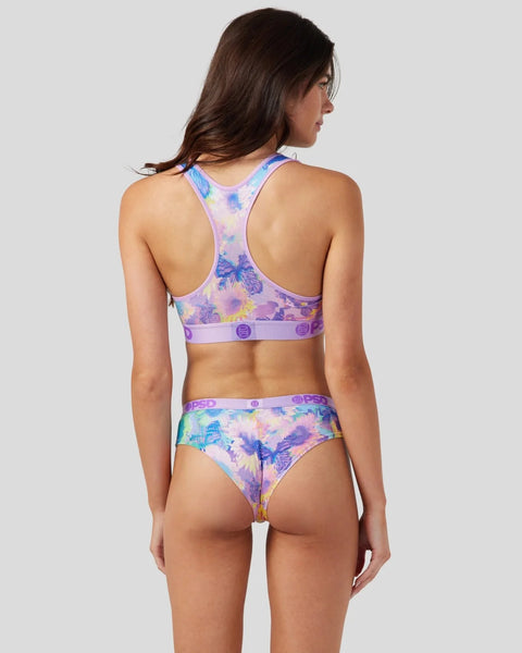 Woman wearing purple and blue butterfly-print sports bra and matching briefs with elastic waistband.