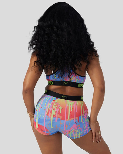Colorful paisley crop top and shorts set with blue, pink, yellow, and green abstract patterns and black elastic bands.