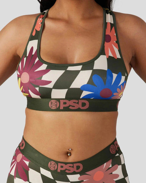 Sports bra with harlequin and floral pattern in olive, cream, burgundy and blue with PSD waistband.