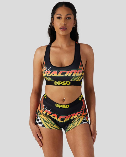Black sports bra and shorts set with "Racing" text in red and yellow graphics and PSD branding.