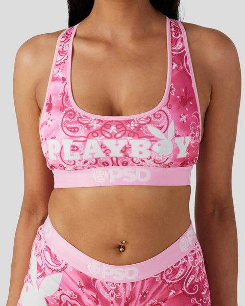 Pink and magenta paisley print sports bra with Playboy branding and elastic waistband.