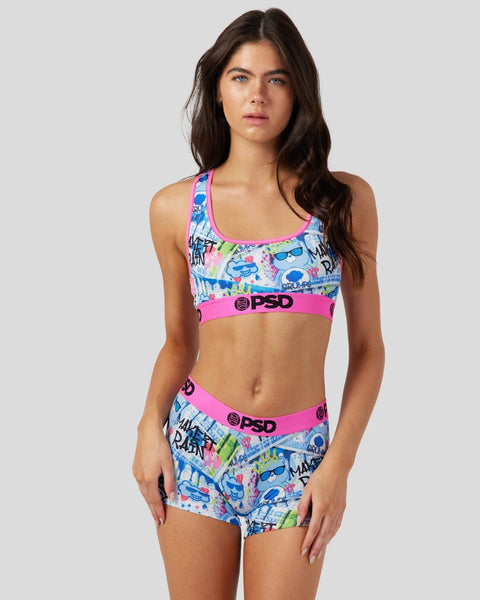 Care Bears colorful printed sports bra and matching shorts set with pink waistbands and PSD branding.