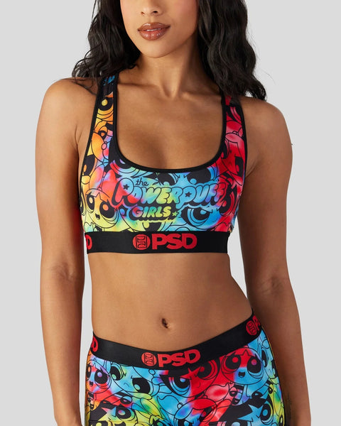 Colorful Powerpuff Girls sports bra with rainbow character graphics and black PSD waistband.