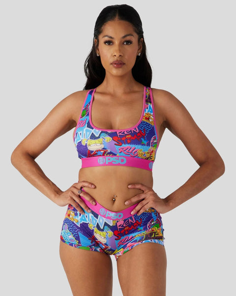 Colorful sports bra and boy shorts set with bright cartoon print, pink trim, and matching waistband.