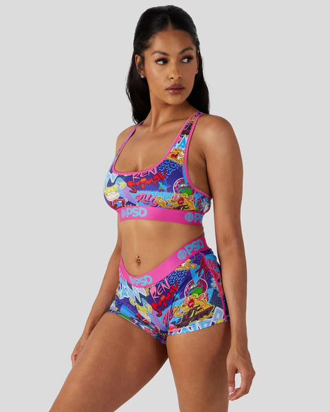 Colorful sports bra and shorts set with cartoon character graphics and pink elastic bands.
