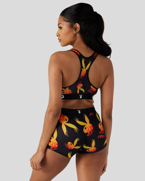 Black sports bra and shorts set with red and yellow flame-pattern design and Playboy bunny logo.