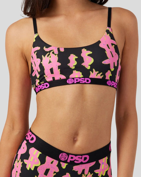 Black sports bra with pink and yellow dollar sign print, PSD waistband, and adjustable black straps.