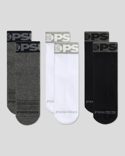 Three quarter socks in grey, white, and black with branded cuffs, displayed flat.