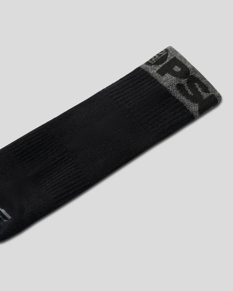 Black quarter sock with grey and white striped cuff detail.