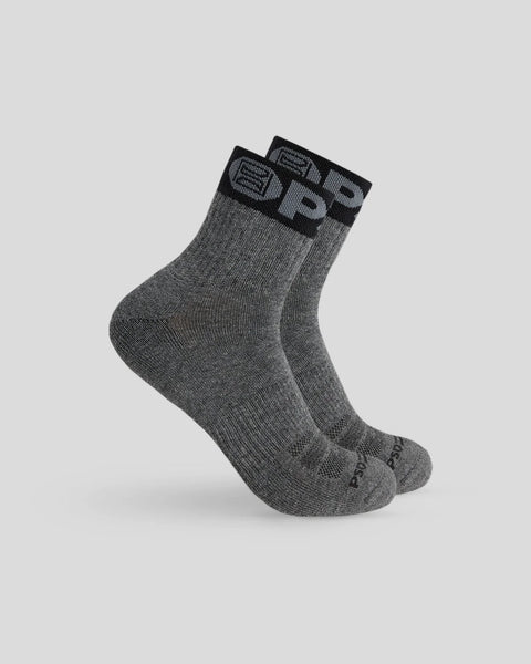 Three quarter-length socks in grey with black band cuffs and tonal branding.