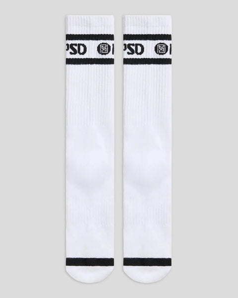 Two white crew socks with black stripes and logo text at the calf.