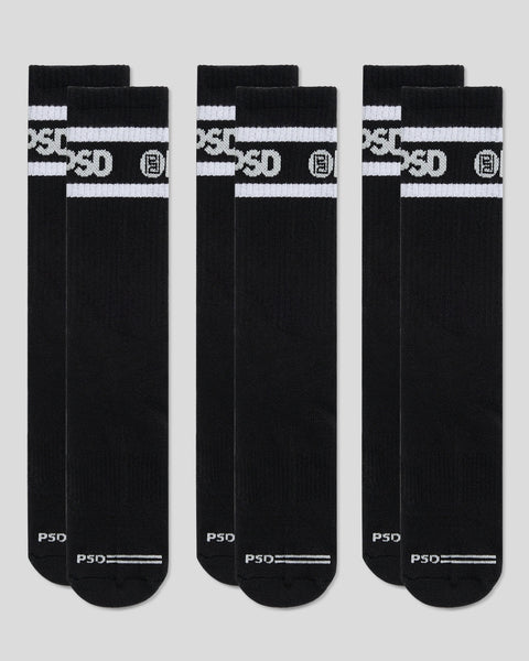Three pairs of black crew socks with white logo stripe and text at cuff and heel.