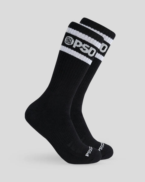 Two black crew socks with white and black striped cuff featuring logo text.