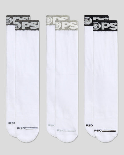 Three pairs of white crew socks with colored band tops and PSD branding.