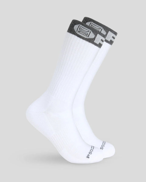 Two white crew socks with gray striped cuffs and text on the heel.