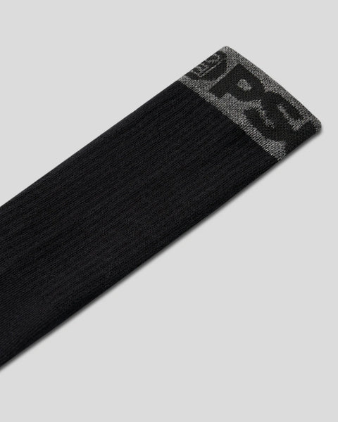 Black crew sock with grey and white striped cuff band detail.