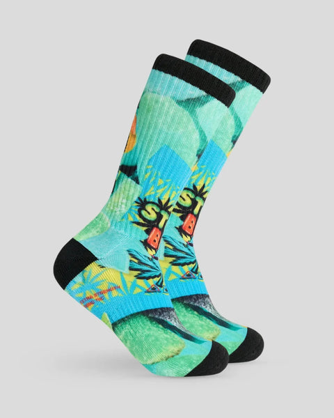 Pair of crew socks with mint, blue, and green colorblock design featuring comic book-style 