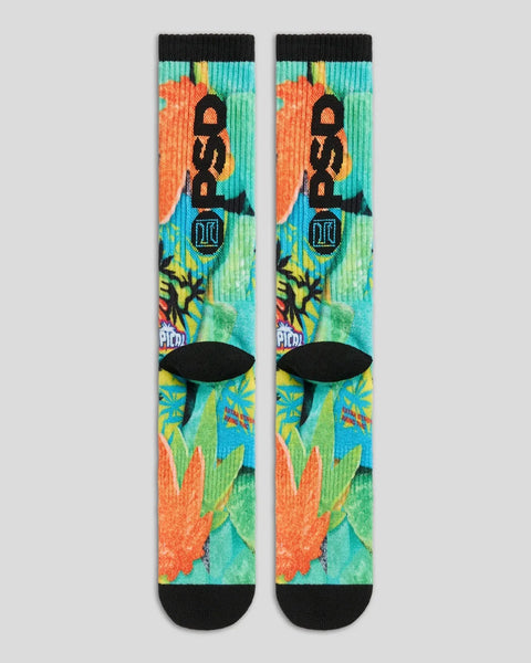 Pair of crew socks with colorful tropical graphics, black toe and heel, and turquoise, orange, and green patterns throughout.