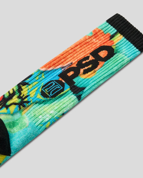 Ribbed crew socks with multi-color tropical design in orange, teal, yellow, and black with text graphic.