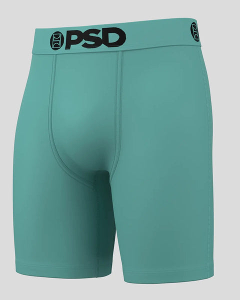 Turquoise PSD boxer briefs with black waistband logo and center seam detail.