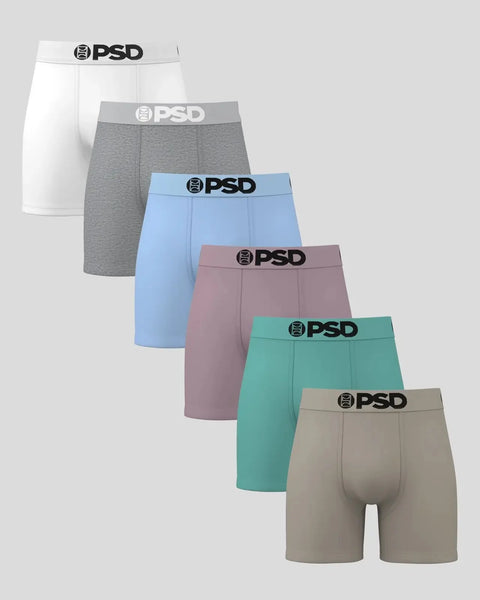 Six PSD boxer briefs in white, gray, light blue, mauve, teal, and tan with branded waistbands.